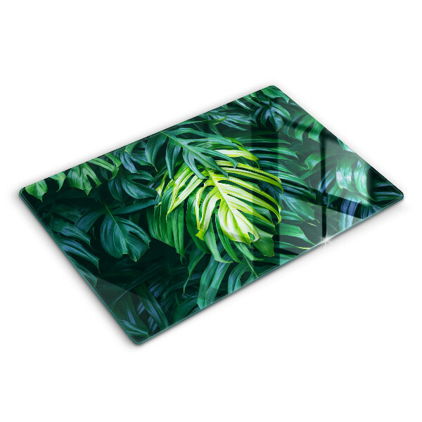 Üveg vágódeszka fényképpel 80x52 cm Vad monstera levelek