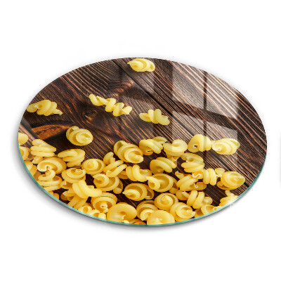 Üveg vágódeszka kerek Tészta az asztalon