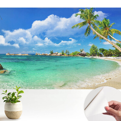 Tapéta Egzotikus tengerparti pálmafák zöldje