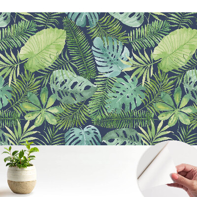 Tapéta Egy leveles trópusi minta tele zöld növényzettel