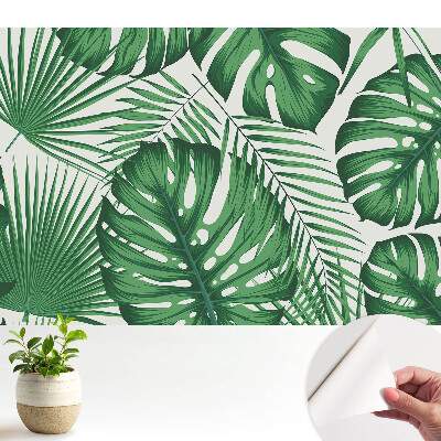 Dekor tapéta zöld trópusi levelekkel, a természet harmóniáját idéző mintával
