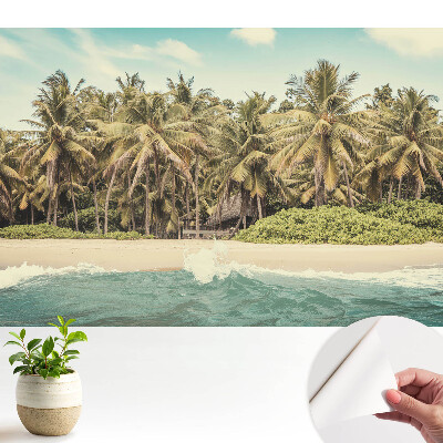 Öntapadós tapéta trópusi pálmafás mintával kék háttérrel