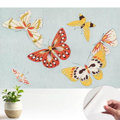 Tapéta színes pillangókkal világos háttér előtt