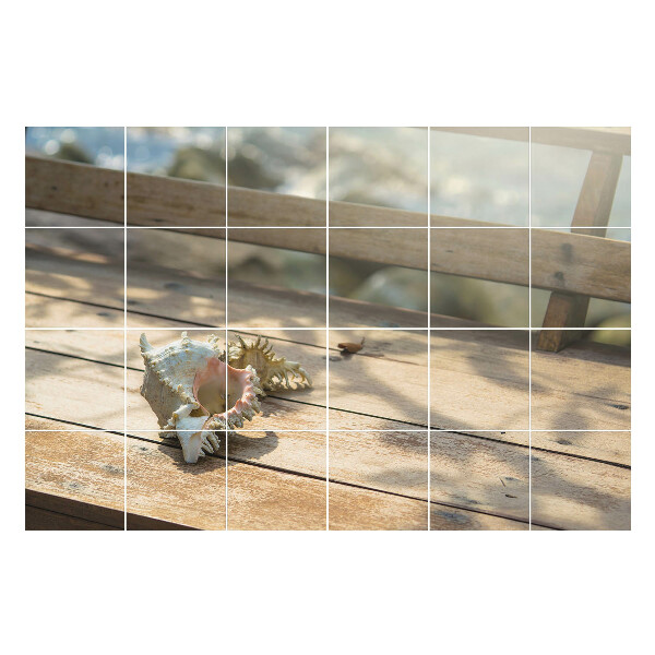 Öntapadós csempe matrica Tengeri kagyló egy fából készült háttér