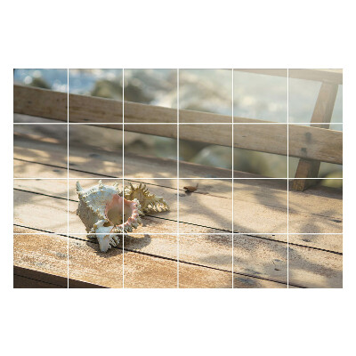 Öntapadós csempe matrica Tengeri kagyló egy fából készült háttér