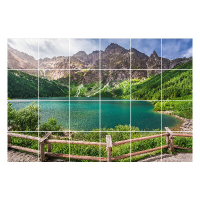 Öntapadós csempe matrica Hegyi táj egy tóval