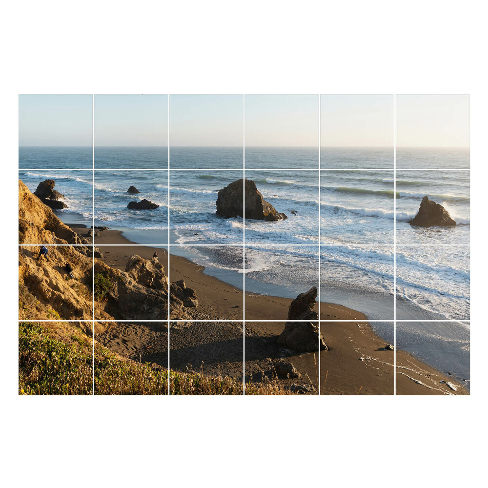 Öntapadós csempe matrica Strand kövekkel és hullámokkal