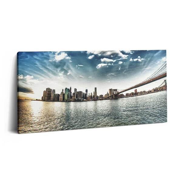 Vászonfotó 100x50 A város és a Brooklyn híd