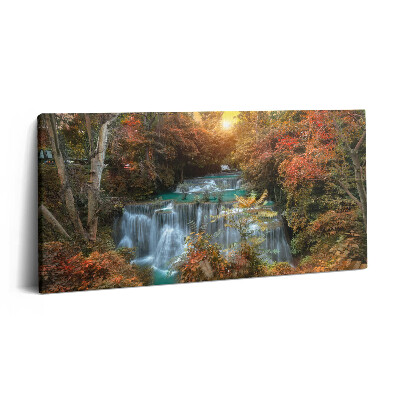 Vászonfotó 100x50 Naplemente egy vízesés felett