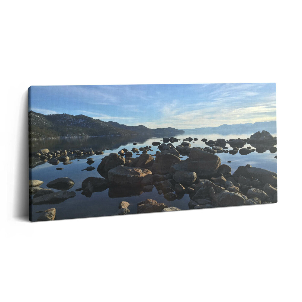 Vászonkép nyomtatás 120x60 Kövek a felhős ég alatt