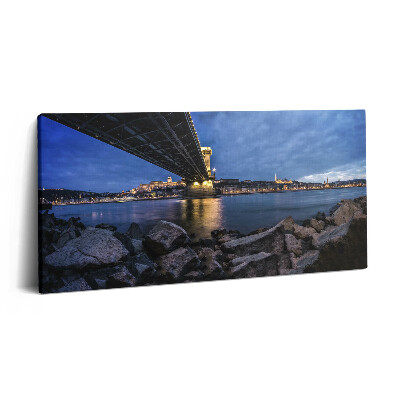 Vászonkép nyomtatás 120x60 Sziklás part egy híd alatt