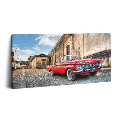 Vászonkép nyomtatás 120x60 Régi piros autó a kolumbiai negyedben