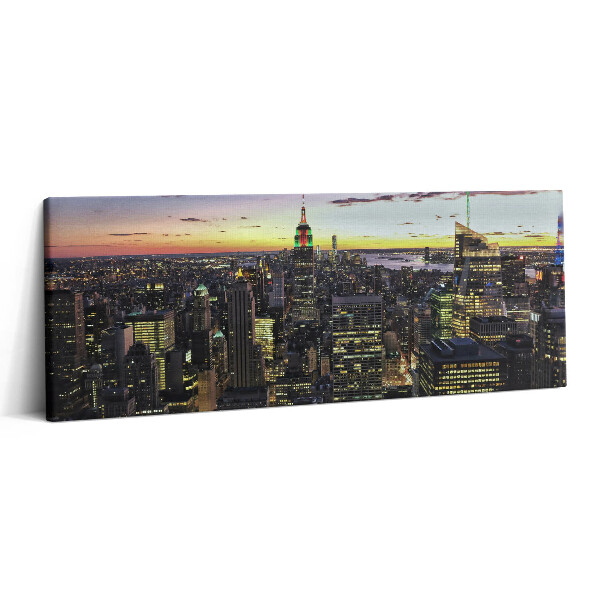 Canvas kép 125x50 Város naplementében