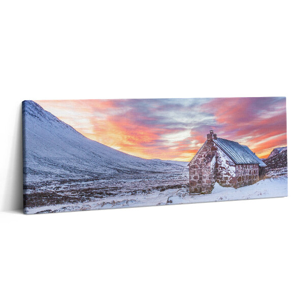 Canvas kép 125x50 Házikó a havas hegyekben