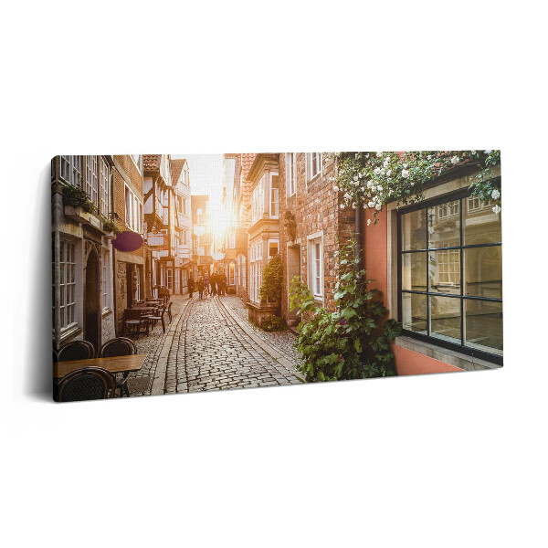 Vászonkép 140x70 Olasz utca épületek között