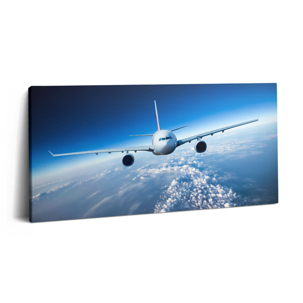 Vászonkép 140x70 Repülőgép a felhők felett
