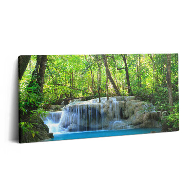 Vászonkép 140x70 Tájkép egy vízesésről egy erdőben