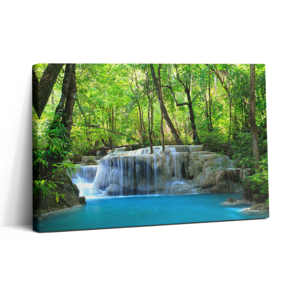 Vászonkép nyomtatás 30x20 Tájkép egy vízesésről egy erdőben