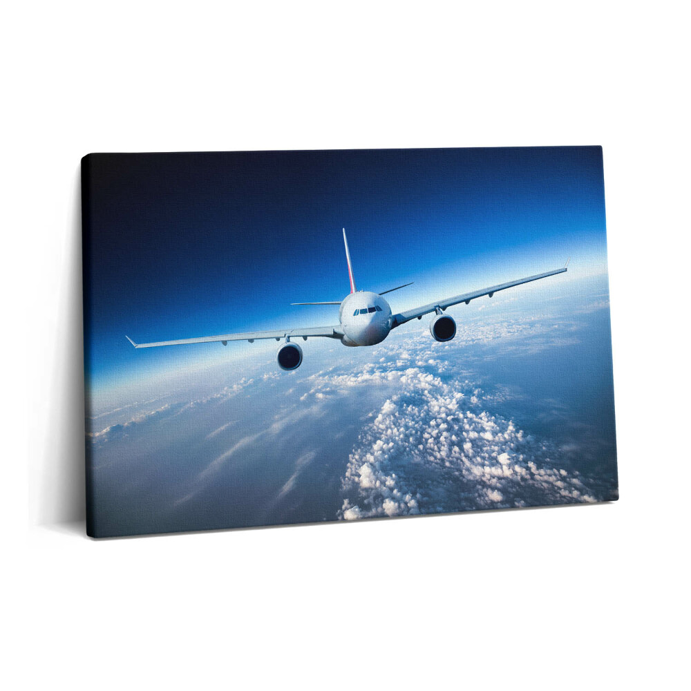 Canvas kép 60x40 Repülőgép a felhők felett