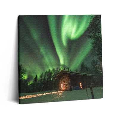 Vászonkép 60x60 Sarki fény és egy ház az erdőben
