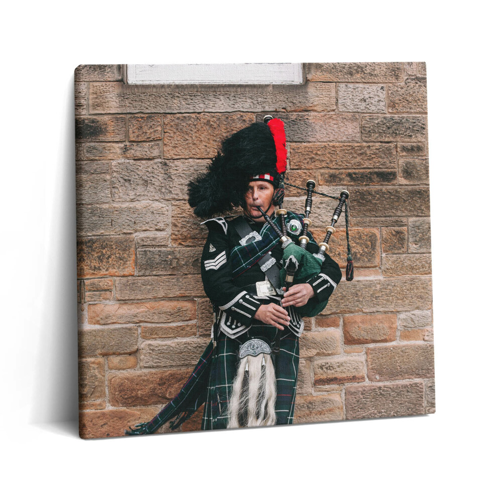 Vászonkép 60x60 Dudán játszó zenész