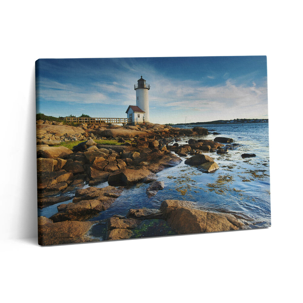 Vászonkép falra 80x60 Tájkép világítótorony sziklákkal és égbolt