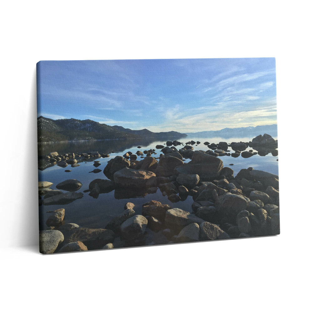 Vászonkép falra 80x60 Kövek a felhős ég alatt