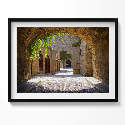 Kép keretben Középkori városkapu macskaköves utca