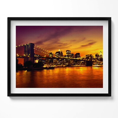 Kép keretben Naplemente a város felett