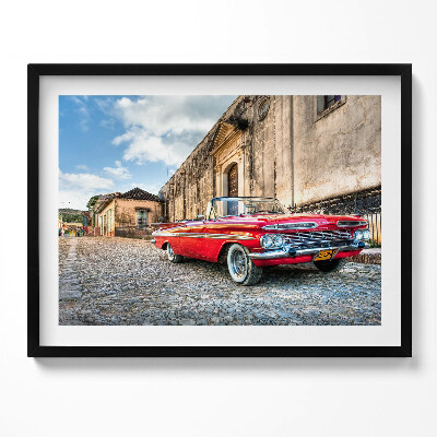 Kép keretben Piros klasszikus autó egy régi épület előtt