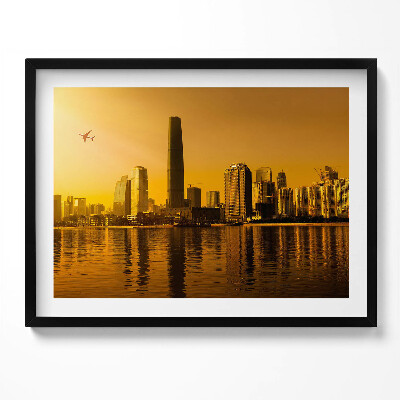 Kép keretben Modern városkép naplementében
