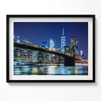 Kép keretben Éjszakai városi táj híd és felhőkarcolók