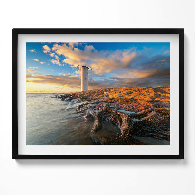 Kép keretben Tengerparti világítótorony naplementében