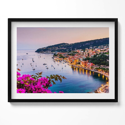 Kép keretben Tengerparti városkép naplementében