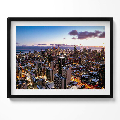 Kép keretben Városi táj naplementében