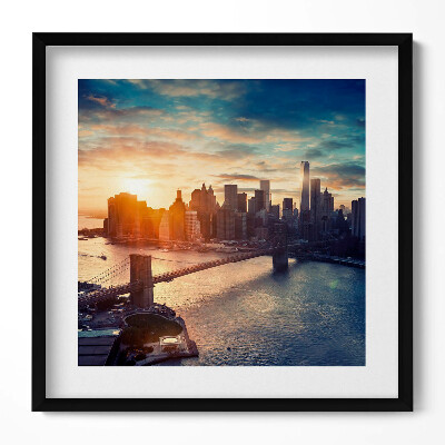 Keretezett falikép Naplemente városi tájjal