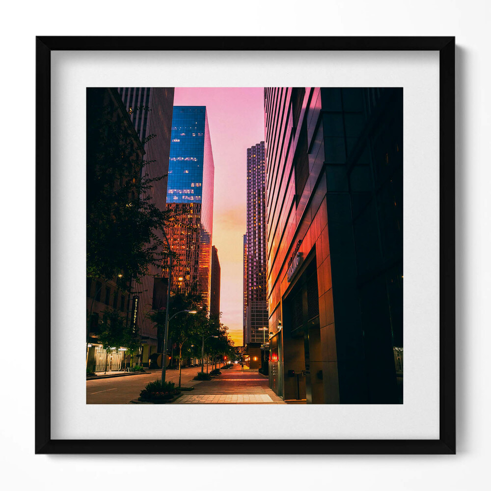 Keretezett falikép Modern városi táj naplementében