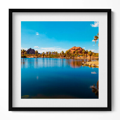 Keretezett falikép Tó pálmafák hegyek kék ég