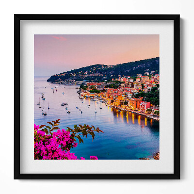 Keretezett falikép Tengerparti városkép naplementében