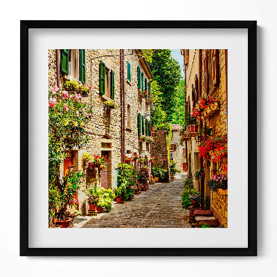 Keretezett falikép Szűk virágokkal díszített utcácska