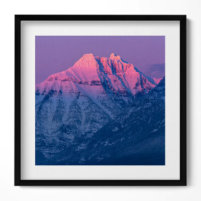 Keretezett falikép Hegyek naplementében tükörkép a vízben