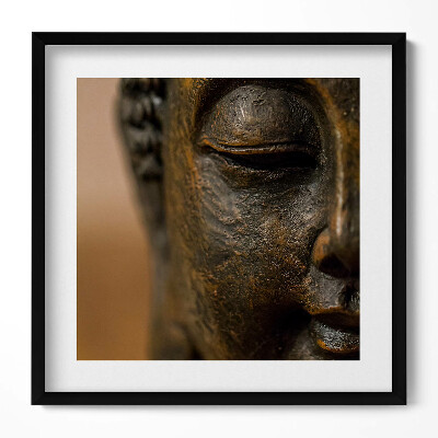 Keretezett falikép Buddha szobor arca