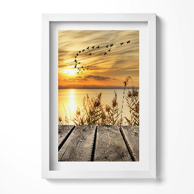 Keretezett kép Naplemente vízparton madarak repülnek