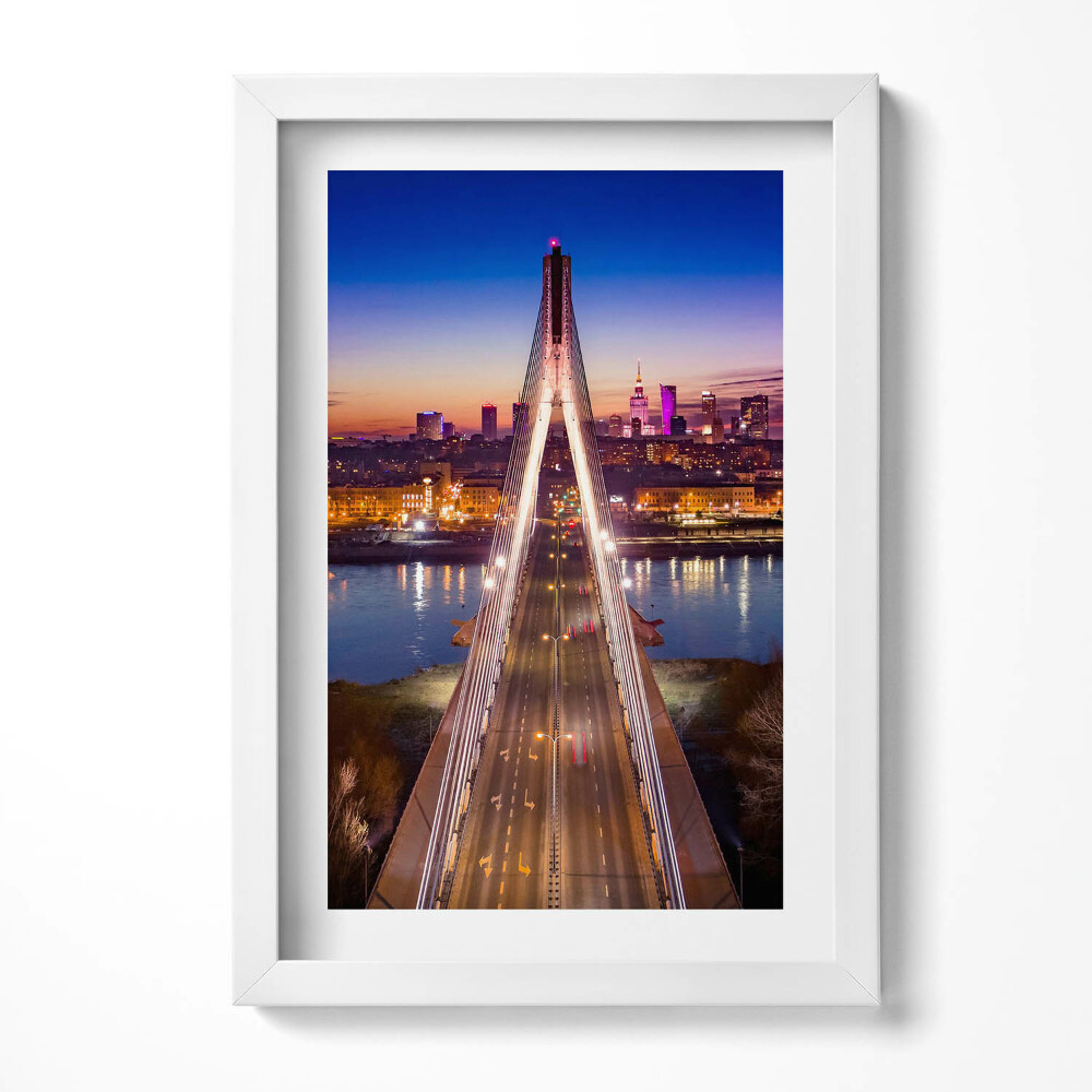 Keretezett kép Híd városi tájjal és naplementével