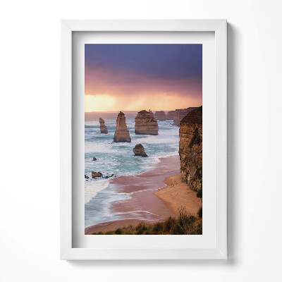Keretezett kép Tengerparti sziklaformációk naplementében