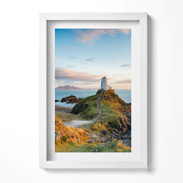 Keretezett kép Világítótorony sziklán naplementében