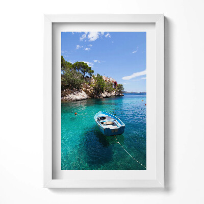 Keretezett kép Tiszta víz csónak sziklás part