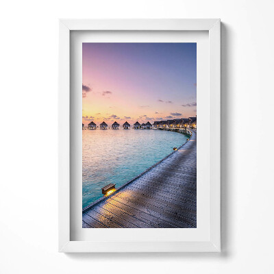 Keretezett kép Tengerparti naplemente vízparti házak