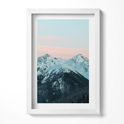 Keretezett kép Havas hegyek naplementében