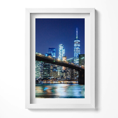 Keretezett kép Éjszakai városi táj híd és felhőkarcolók